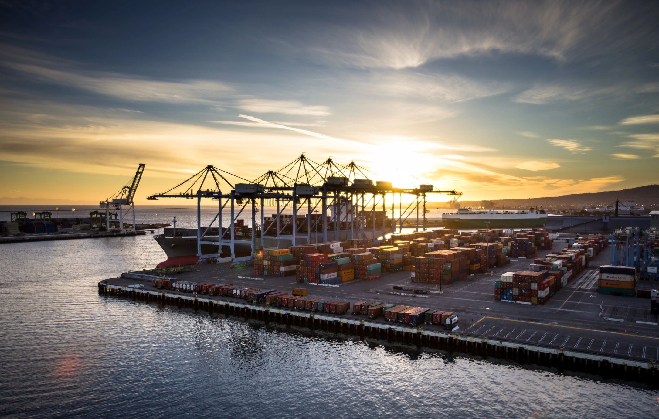 Ship Unloading in Port at Sunset - Sunset